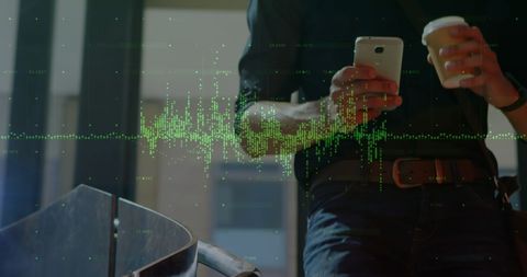 Business Professional Engaged in Mobile Data Analysis