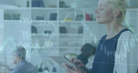 Businesswoman Analyzing Market Data on Tablet