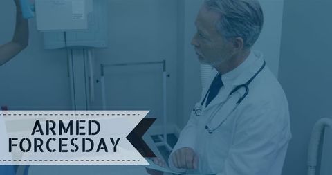 Celebration of armed forces day with senior caucasian doctor