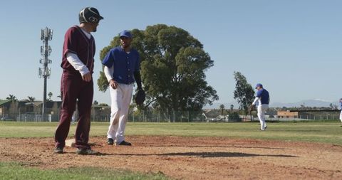 Baseball players on field amid competition and camaraderie