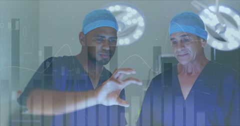 Surgeons Analyzing Data in Operating Room