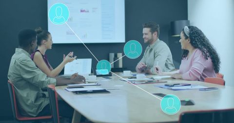 Diverse Team Networking with Data Processing Visualization in Modern Office