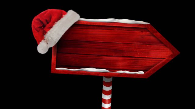 Wooden sign with Santa hat and snow offering blank space for custom text is perfect for holiday greetings, festive marketing materials, seasonal advertisements or decorative purposes for Christmas celebrations.