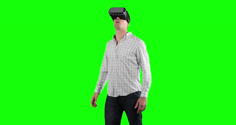 Man Interacting with VR Technology on Green Screen Background