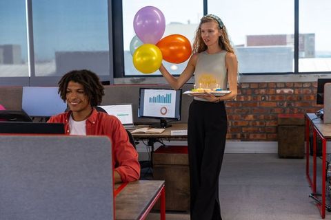 Coworkers Celebrating Birthday at Modern Office