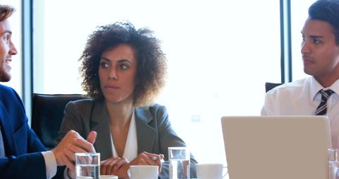 Diverse Business Team Discussing at Office Table
