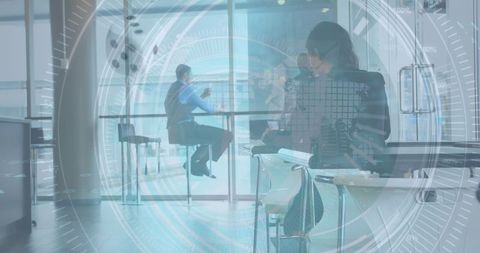 Futuristic Data Overlay on Business Meeting in Modern Office