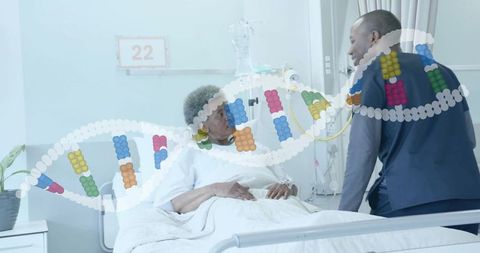 Clinician consulting african american senior in hospital bed with dna double helix overlay