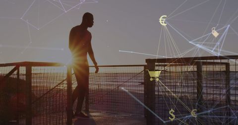 Man jogging with technology overlay at scenic beach