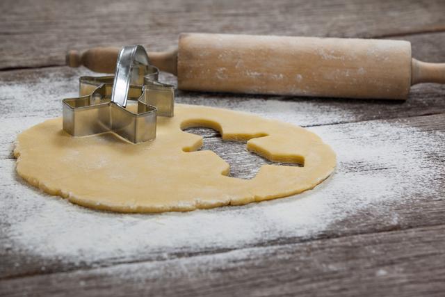 Dough with gingerbread shape and rolling pin - Download Free Stock Photos Pikwizard.com