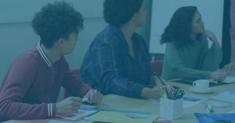 Diverse Team Planning Creative Workshop with Resources