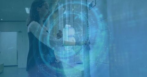 Woman using card access reader for secure facility entry