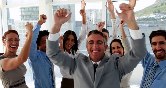 Joyful Business Team Celebrating Success in Bright Office - Download Free Stock Images Pikwizard.com