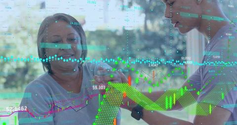 Smiling senior receiving arm support from caregiver with wearable health data overlay