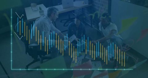 Team Collaboration Analyzing Data in Modern Office