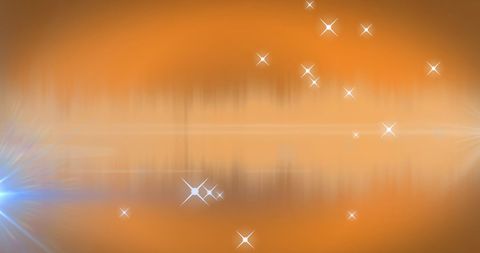 Magical Sparkling Stars on Soft Orange Glow