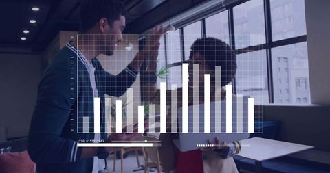 Business professionals celebrating success with bar chart overlay