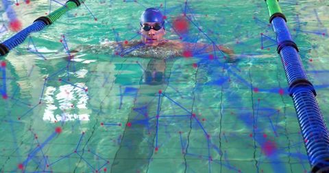 Competitive Swimmer Propelling Through Turquoise Pool Lanes with Digital Data Overlay