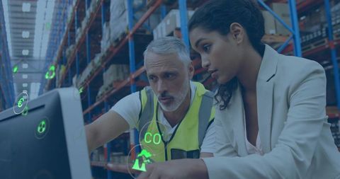 Warehouse team reviewing AR logistics dashboard for inventory control and workflow