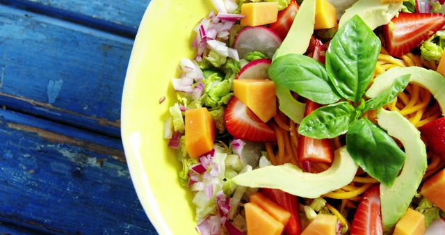 Vibrant Fresh Salad with Avocado, Strawberries, Cheese, and Fresh Vegetables - Download Free Stock Images Pikwizard.com