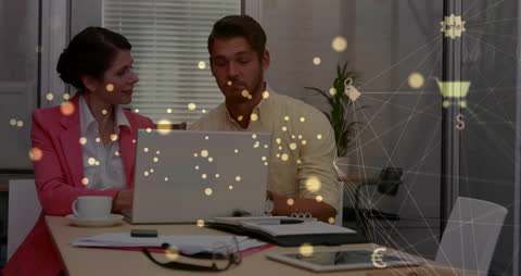 Business Team Analyzing Digital Network on Laptop