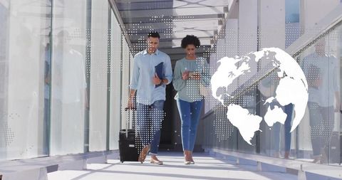 Business travelers with luggage in airport walkway combining global connectivity