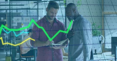 Business colleagues analyzing data in modern office setting