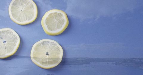 Lemon Slices on Blue Seascape Cloth Flatlay, Copy Space for Summer Food and Drink
