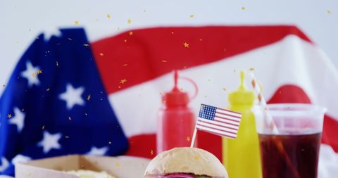 Grilling Fun with American Flag Background & Fast Food