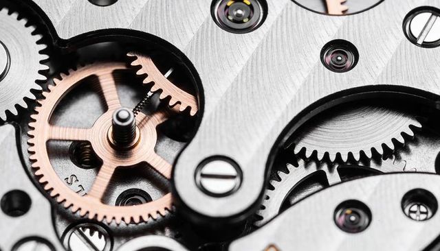 Macro precision watch movement turning with copper gear and brushed steel cogs
