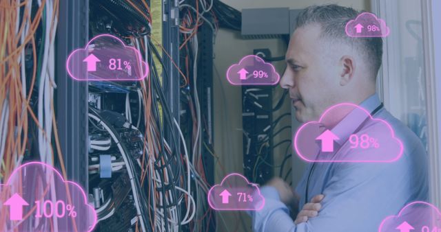 Engineer Monitoring Data Upload Progress in Server Room - Download Free Stock Images Pikwizard.com