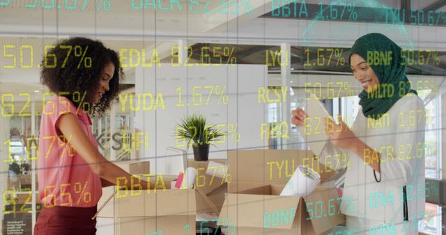 Diverse businesswomen with market data overlay preparing orders - Download Free Stock Images Pikwizard.com