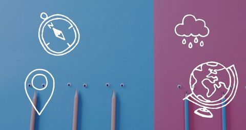 Creative flat lay with pencils, geographical doodles and eyes