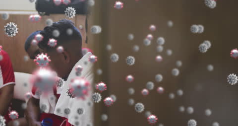 Diverse Athletes in Locker Room with Overlay of Virus Cells