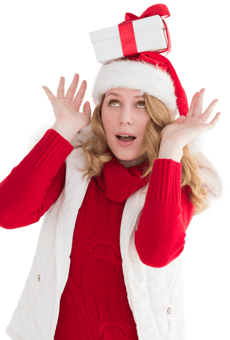 Woman in Santa Hat Balancing Gift on Head with Fascinated Expression