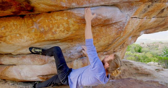 Male Rock Climber Practicing Bouldering On Rocky Outcrop - Download Free Stock Images Pikwizard.com