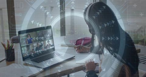 Teen Girl Wearing Headset Taking Notes During Remote Math Class on Laptop at Desk