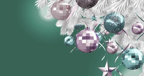 Elegant Christmas Ornaments on White Flocked Tree Branch