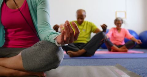 Senior Group Meditating during Yoga Session in Studio - Download Free Stock Images Pikwizard.com