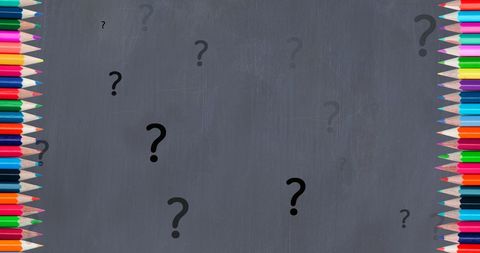 colorful crayons framing question marks on chalkboard - Download Free Stock Images Pikwizard.com