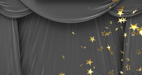 Golden Stars Falling on Dark Theater Curtain