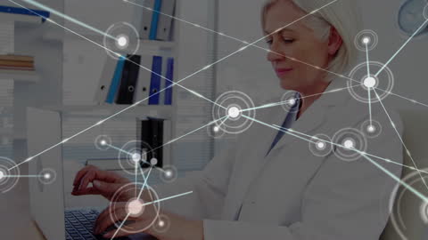 Senior Female Doctor Working with Digital Network Overlay