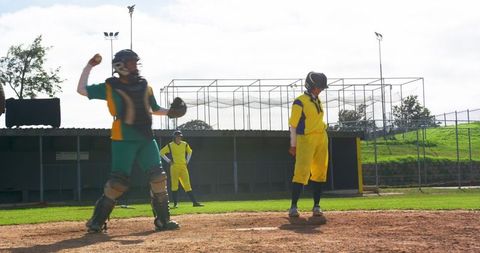 Baseball Catcher Throwing Ball with Precision on Sunny Day