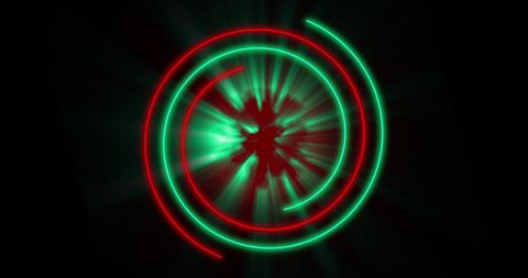 Neon red and green circles on black background