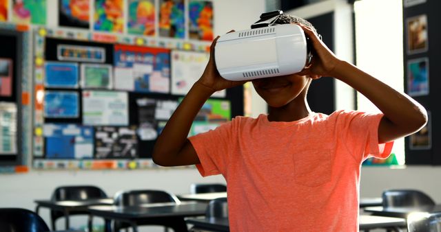 A child wearing a virtual reality headset in a classroom, engaging in an immersive learning experience. This image can be used in educational content, technology promotions, or articles discussing innovative teaching methods and inclusion of modern technology in schools.