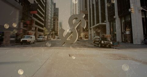 Symbolic Fall of Dollar Among Rising Bitcoin in Urban Landscape