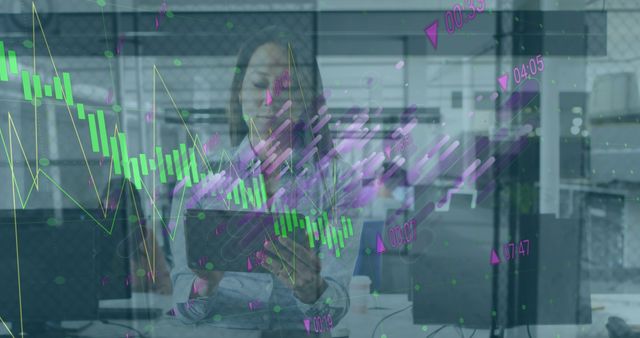 Composition of financial data processing over asian businesswoman using tablet in office. Global business, finance and data processing concept digitally generated image.