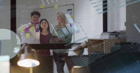 Team Analyzing Data Projections in Modern Office Environment