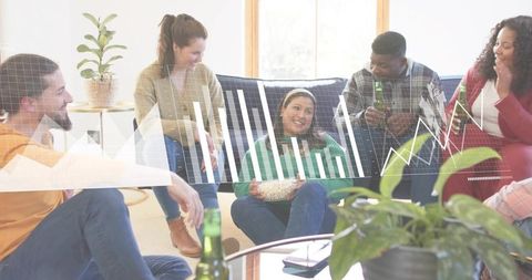 Friends laughing and sharing popcorn on couch and floor, casual cozy hangout with beverage