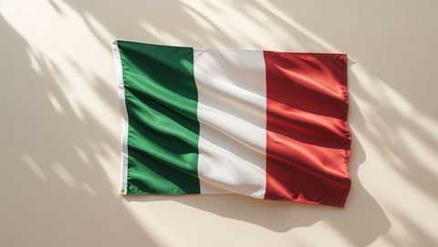 Italian Flag Waving with Soft Floral Light on Beige Wall